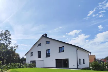 Exklusives Neubauhaus in Ziegelbauweise mit außergewöhnlich großem Garten - TOPIMMOBILIE