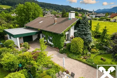Wohlfühlen garantiert! Attraktives Wohnhaus mit Garage, Pool und wunderschöner Gartenanlage