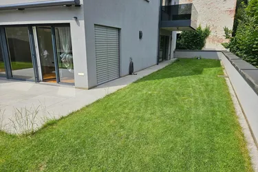 MODERNE 5 ZIMMER GARTENWOHNUNG MIT TG-STELLPLÄTZEN