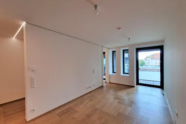 Expose Design-Apartment mit großer Loggia am ROCHUSMARKT