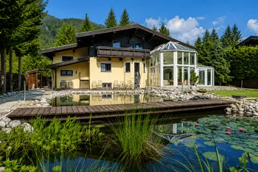 Objekt Nr.: P1119:St. Ulrich a.P. - STARKE PREISREDUKTION - Außergewöhnliches Landhaus mit Einliegerwohnung, Schwimmteich und stilvollem Wintergarten in Traumlage