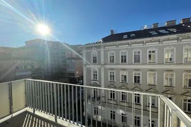 Frömmlgasse - heller Neubau mit Balkon