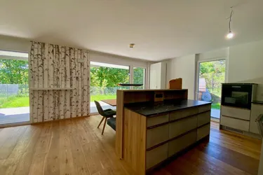 Erstbezogene, top ausgestattete 3-Zimmer-Gartenwohnung in Grünlage von MILS