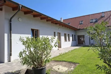 Attraktive, ebenerdige Wohneinheit mit Gartenbenutzung!