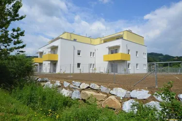 Expose Geförderte Genossenschaftswohnung mit Eigengarten - Miete mit Kaufoption