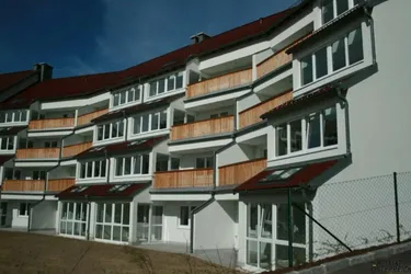 Expose Geförderte Genossenschaftswohnung mit Wintergarten - Miete mit Kaufoption