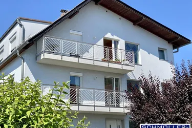 Dachgeschoss-Wohnung mit Garten und Balkon