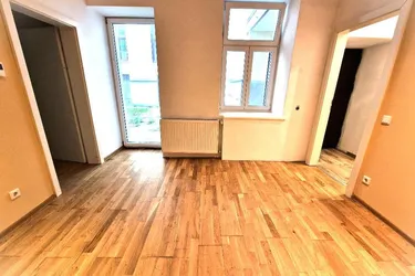 TERRASSENWOHNUNG! Kompakte 3-Zimmer-Wohnung mit 32 m² Innenhof-Terrasse
