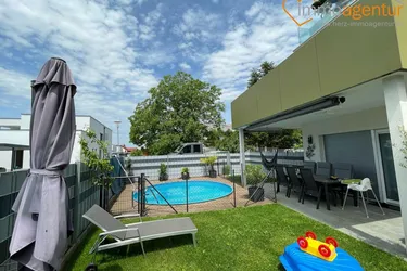 Family-Feeling trifft Wohnkomfort! Neuwertig, modern, familienfreundliche Gartenwohnung mit Pool zum Verlieben!