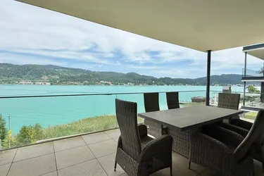 Luxusapartment mit unverbaubarem Panorama-Seeblick und privatem Seezugang am Wörthersee
