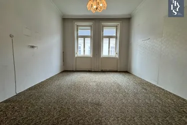 Sanierungsbedürftige 1-Zimmerwohnung in traumhaften Stilaltbau