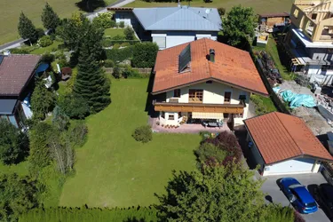 PREISREDUKTION - Sonniges Einfamilienhaus mit Einliegeroption &amp; großem Garten – Wohnen am Walchsee