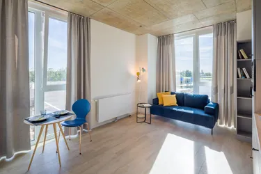 Expose Hochwertig möbliertes Apartment über den Dächern Wien - YOUNIQ Vienna TrIIIple / Top-modernes Hochhaus