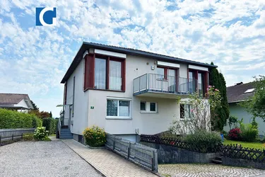 Hochwertige 3 Zimmerwohnung mit Gartenanteil