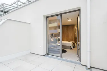 Traumhafte Terrassenwohnung inkl. Gym, Sauna &amp; riesige Gemeinschaftsdachterrasse direkt an U1 und HBF-Nähe!