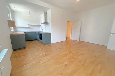 Perfekt aufgeteilte 2-Zimmer Wohnung mit offener, möblierter Küche!