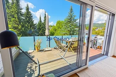 Moderne 4-Zimmer-Dachgeschoßwohnung mit Villencharakter, großem Balkon und Garage am Wienerwald