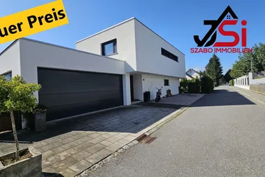 Dieses neuwertige Einfamilienhaus mit beheizten Pool ist ein Blickfang.