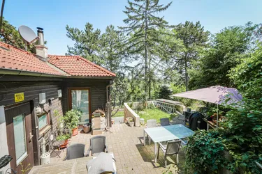 Ferienhaus mit großem Grundstück &amp; Donaublick in Döbling – Refugium mit Potenzial