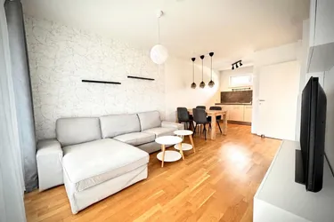 Sonnige 2-Zimmer-Eigentumswohnung mit großer Terrasse und Carportstellplatz