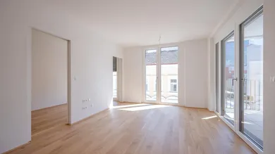 Wohnzimmer mit südseitiger Loggia