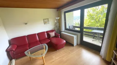 Wohnraum mit Seeblickbalkon