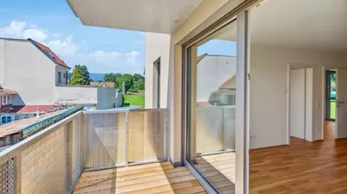 Top 5 - 1. OG - Wohnung mit Balkon und Gartenanteil