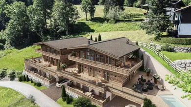 Zwei trendige Chalets in Toplage