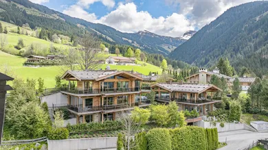 KITZIMMO-Luxusvilla in prominenter Toplage kaufen - Immobilien Aurach bei Kitzbühel.