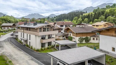 KITZIMMO-Neubau-Gartenwohnung kaufen - Immobilien Fieberbrunn Tirol.