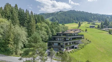 KITZIMMO-Luxuswohnung im Chaletstil kaufen Immobilien Kirchberg Tirol.