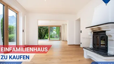 Heller Wohnbereich im EG mit Ofen