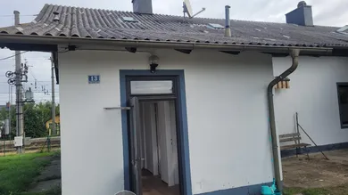 01 Exposé Eingang Haus