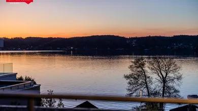 Seeblick und Sonnenuntergang in Traumvilla