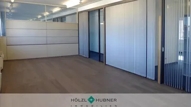hoelzl hubner immobilien nuero in modernem gebaeude
