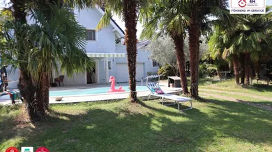 Garten – Vorderseite mit Palmenhaus