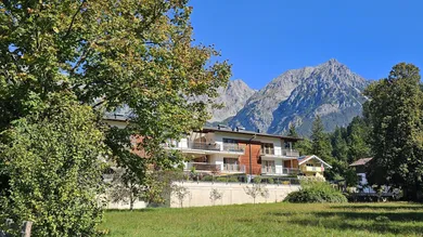 Ansicht Wohnhaus im Süden, Schöne 3-Zimmerwohnung mit Stellplatz, Scheffau