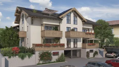 Frontansicht mit beiliegenden Carports und freien Stellplätzen