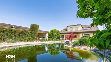 Sehr schönes Wohnhaus mit Badeteich / Swimming Pool