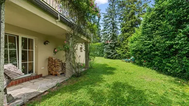 Garten mit Zugang zur unteren Wohn- & Kellerebene