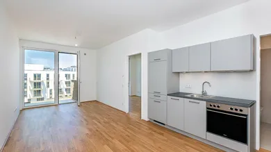 Wohnbereich mit Blick in den Innenhof (Beispielbild Vergleichswohnung)