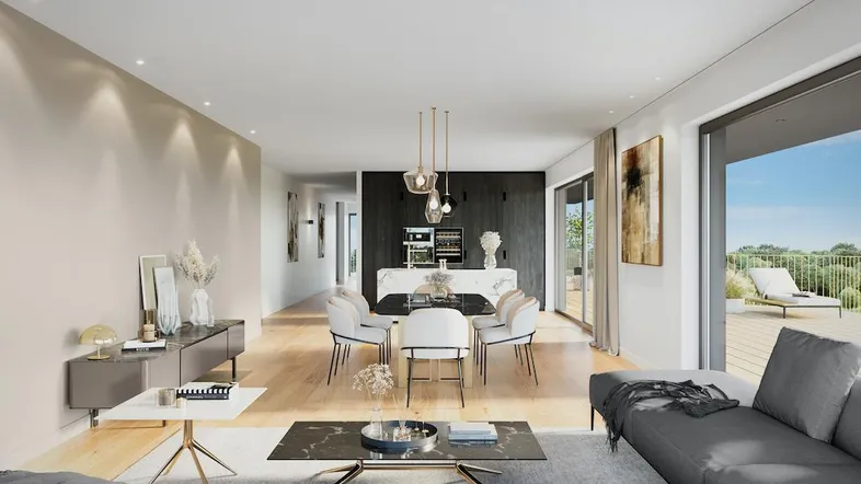 Modernes, offenes Wohn-Esszimmer mit Holzboden, integrierter Küche und Zugang zur Terrasse.