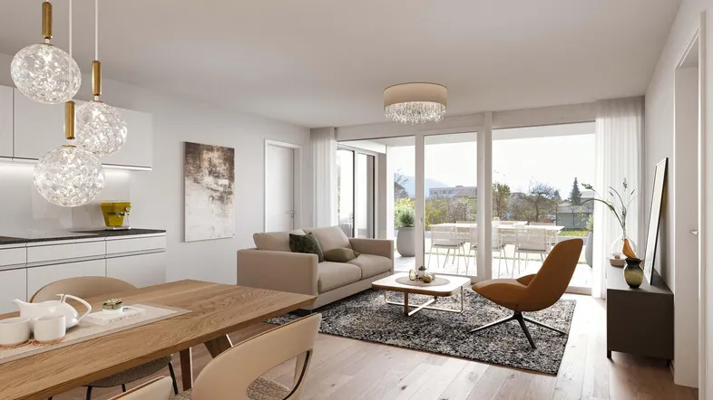 Moderne offene Wohnküche mit Essbereich, Parkettboden und großzügigem Zugang zur Terrasse.
