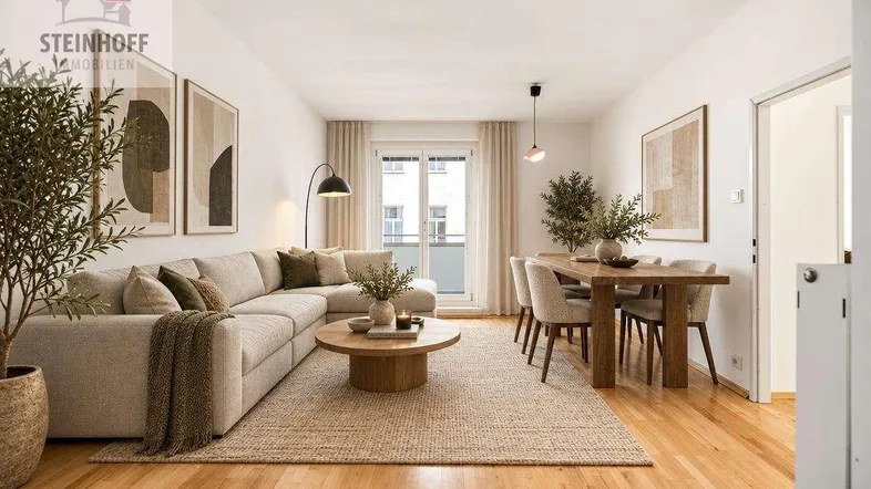 Heller, offener Wohn- und Essbereich mit modernem Sofa, Holztisch und Zugang zum Balkon.