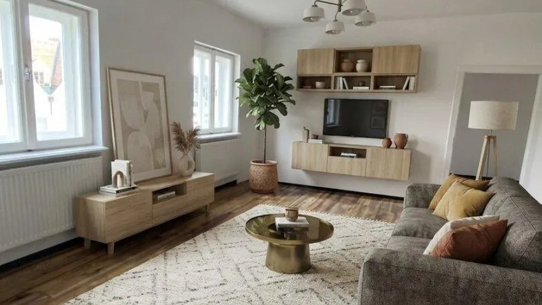 Helles Wohnzimmer mit modernem Interieur, Holzboden und großem Teppich, ideal zum Entspannen.