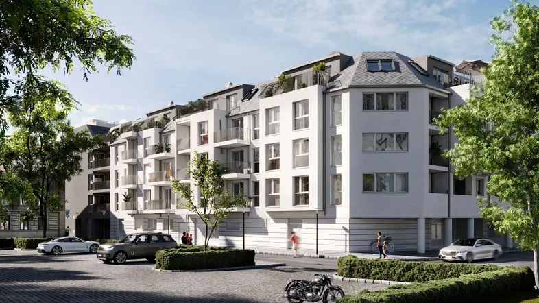 Moderne Wohnanlage mit mehreren Etagen, Balkonen und Dachterrassen in städtischer Umgebung.