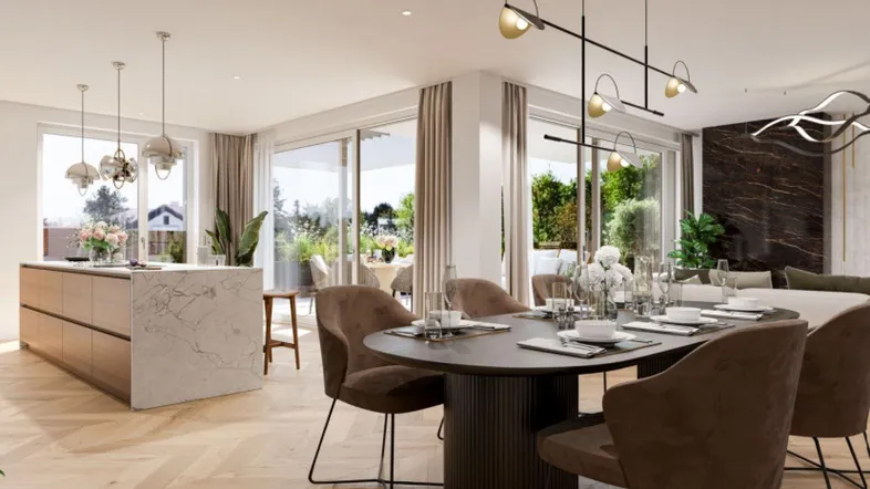 Helles, offenes Wohn- und Esszimmer mit moderner Küche, Parkettboden und Zugang zur Terrasse.
