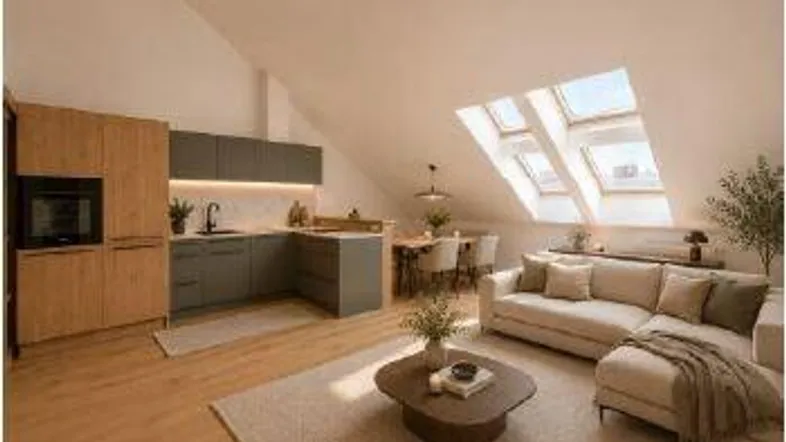 Modernes, offenes Wohnzimmer mit integrierter Küche, Essbereich und Dachfenstern unter einer Dachschräge.