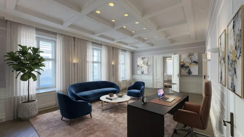 Elegantes Büro mit blauen Samtmöbeln, einem großen Schreibtisch und einer Kassettendecke.