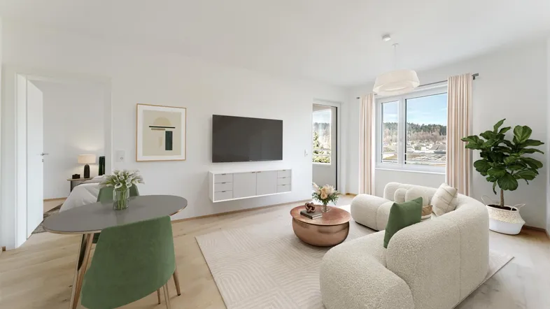 Modernes, helles Wohn-Esszimmer mit stilvollen Möbeln, Holzboden und Zugang zum Balkon.